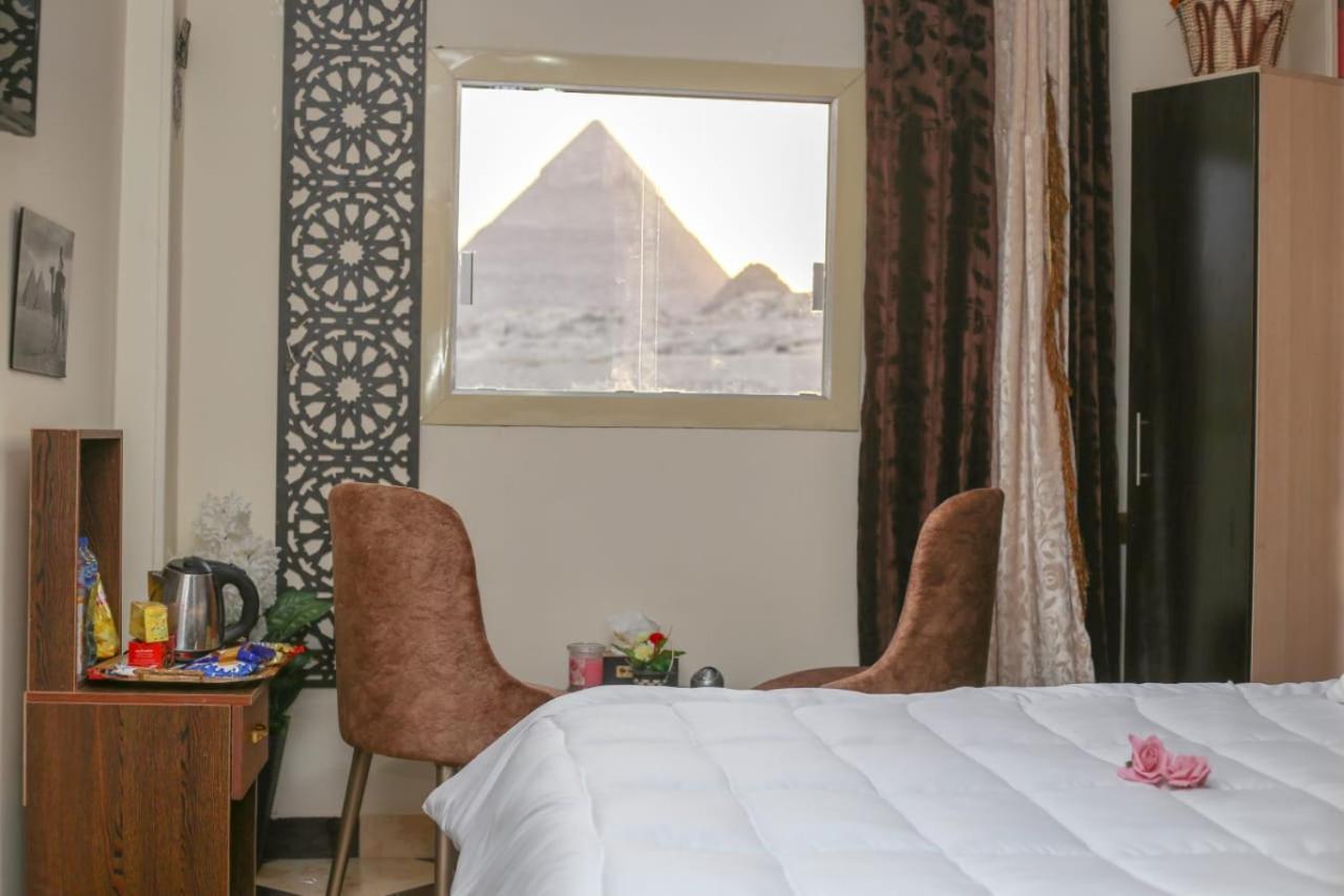 Pyramids Show Hotel Kafret el-Gabal Exteriör bild