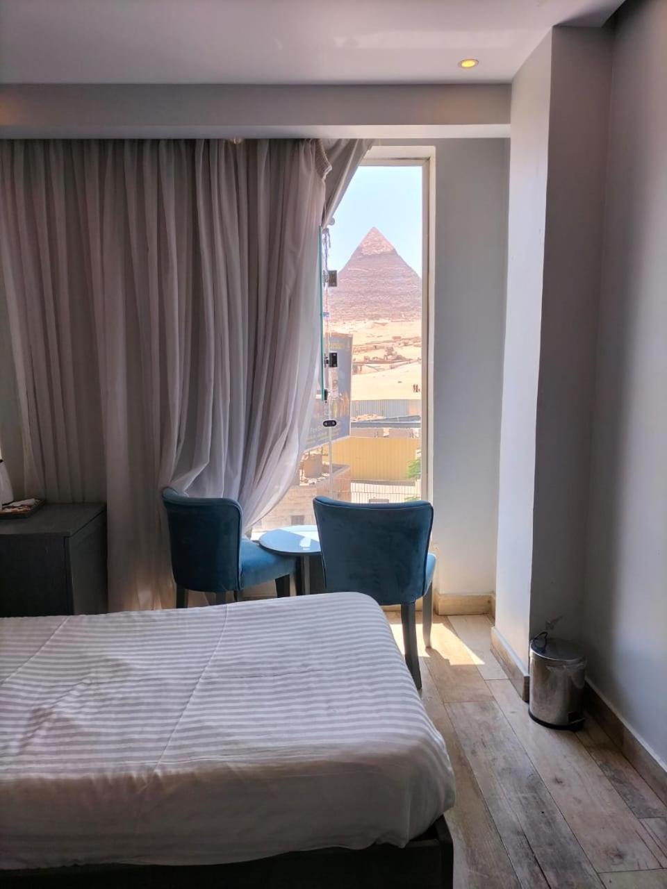 Pyramids Show Hotel Kafret el-Gabal Exteriör bild